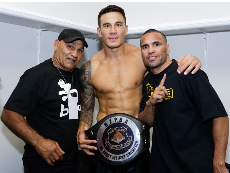Sonny Bill Williams poses with the Mundines after his debut as Anthony's undercard