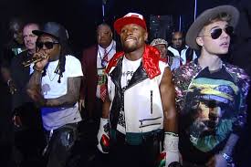 Floyd Mayweather Jnr, coming out the entrance with his TMT cronies, Lil Wayne and Justin Beiber