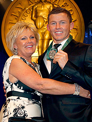 HAPPIER TIMES: Todd Carney celebrates a Dally M win with his long-suffering mother. Well before the NRL decided to make a scapegoat out of him.