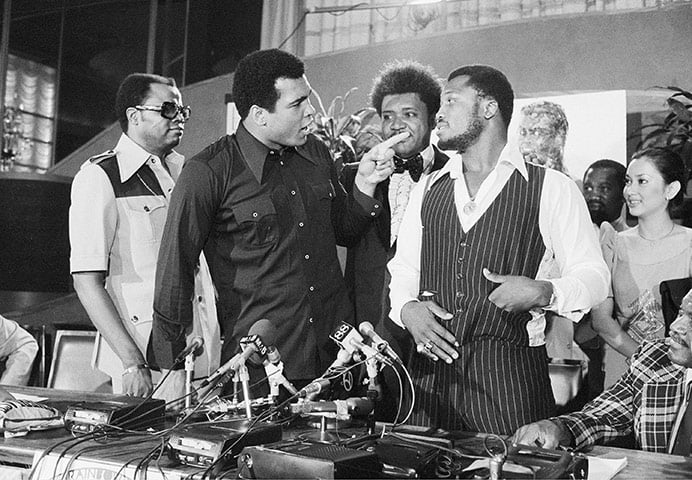 New York City Thursday, July 17, 1975, the original Thrilla in Manila - Joe Frazier and Muhammad Ali poss with Don King at a press conference to promote the fight.