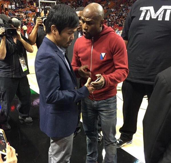 Pacman and Money Maweather meet for the first time at a Miami Heat in game on Tuesday night.