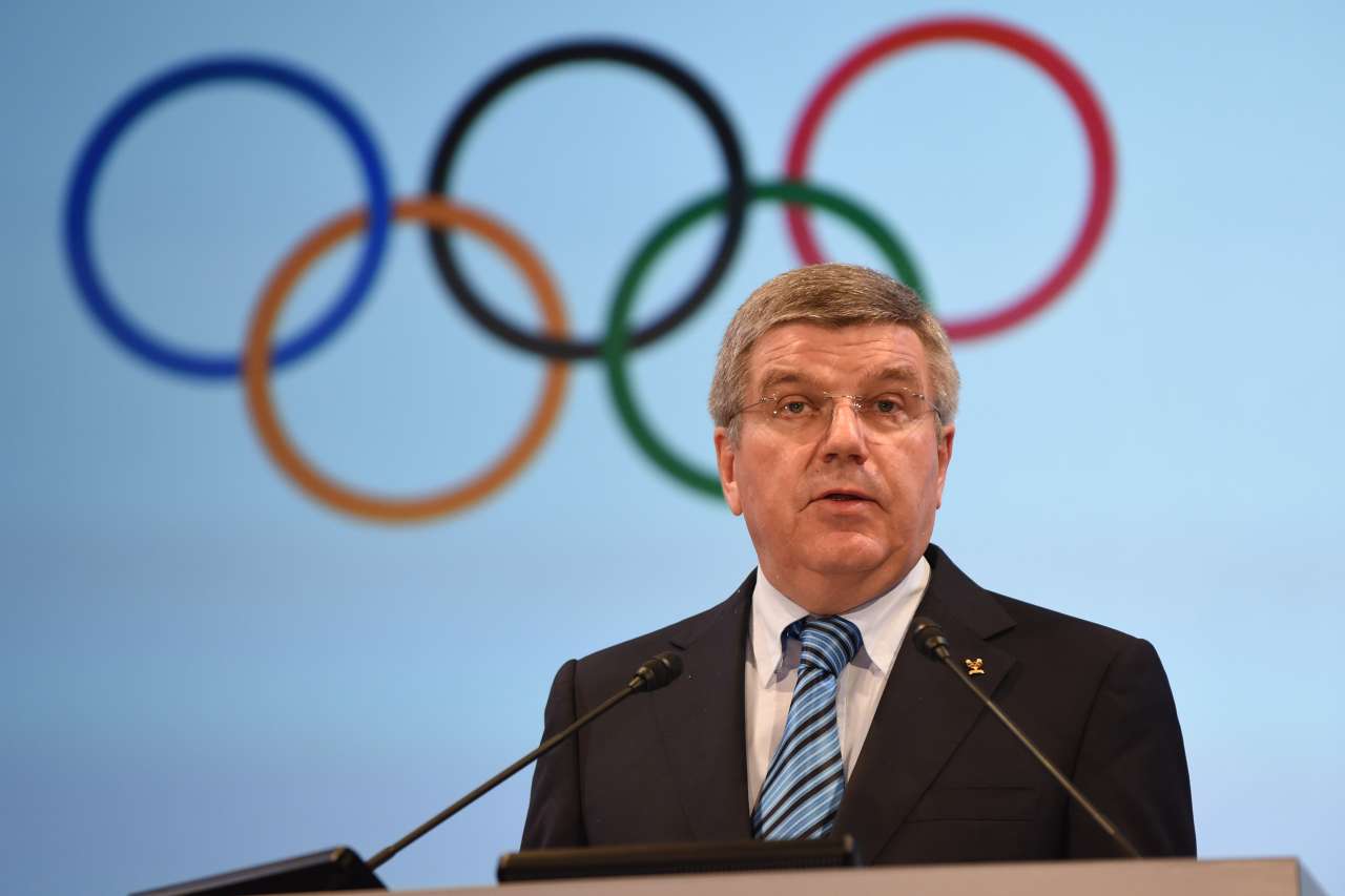 IOC Presdent, Thomas Bach fronts international news camera's at a press conference in Switzerland yesterday.