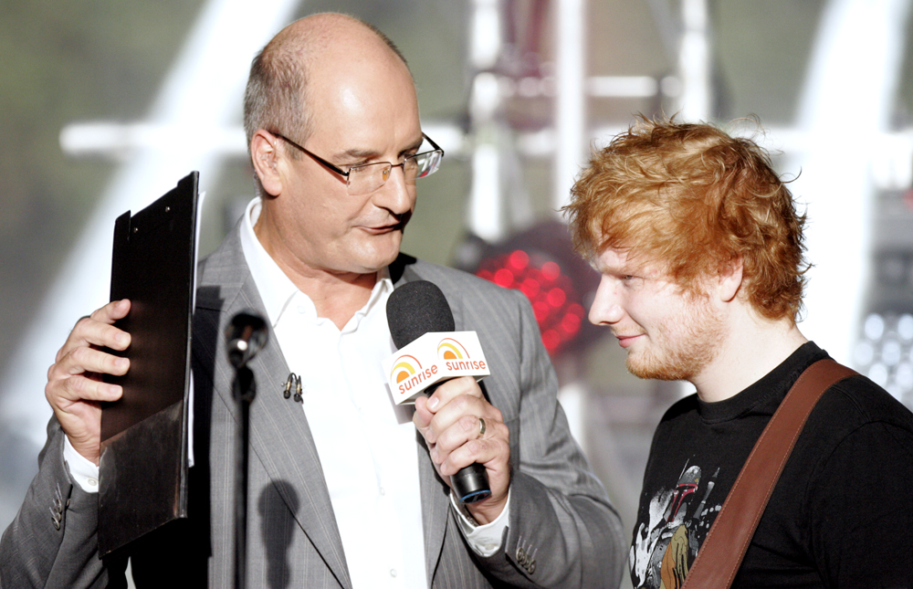 David Koch is made to look unusually handsome when paired next to the extremely pasty rednut known as Ed Sheeran