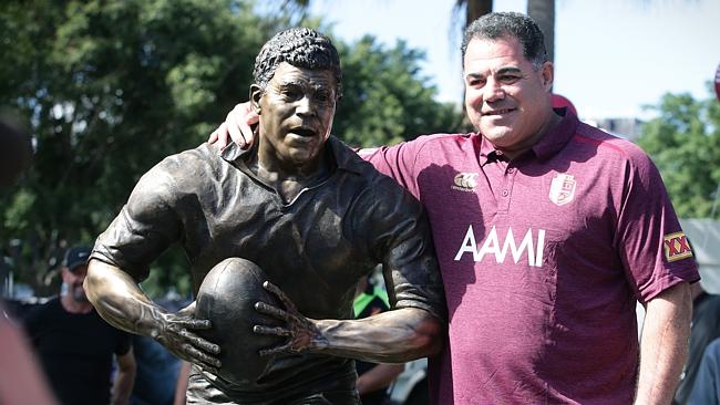 Mal Meninga, (seen posing with a bronze statue of himself) is only several years older than most of his star players