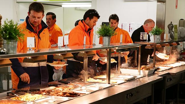 Moranabah miners serving themselves breakfast at bain-marie. Most miners put on an estimated 10-20 extra kilos while eating deep fried food on the job.