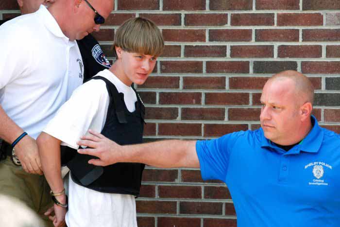 Dylann Roof, 21 is lead into custody in a bulletproof vest. It is quite clear that he does not have much to look forward to in prison.