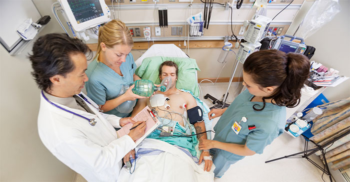 A patient receiving an emergency nang and intravenous butter chicken after consuming an entire 10-pack of MDMA caps and a carton of Jim Beam cans. PHOTO: Supplied.