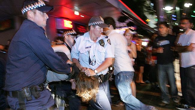 AAP cameras capture a traditional Queensland man in his natural environment, being manhandled by overzealous police represented an ever-increasing nanny state